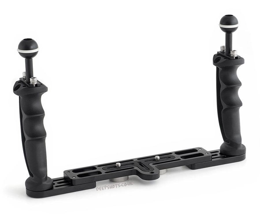 Black camera grip with two handles on a white background